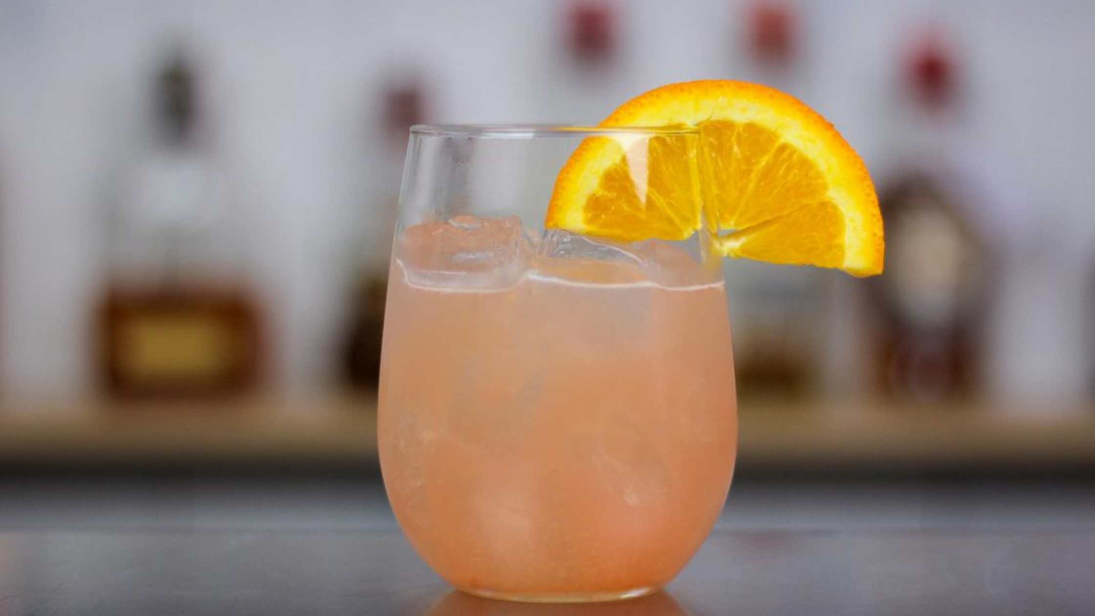 A bottle of Aperol and cocktail illustrations